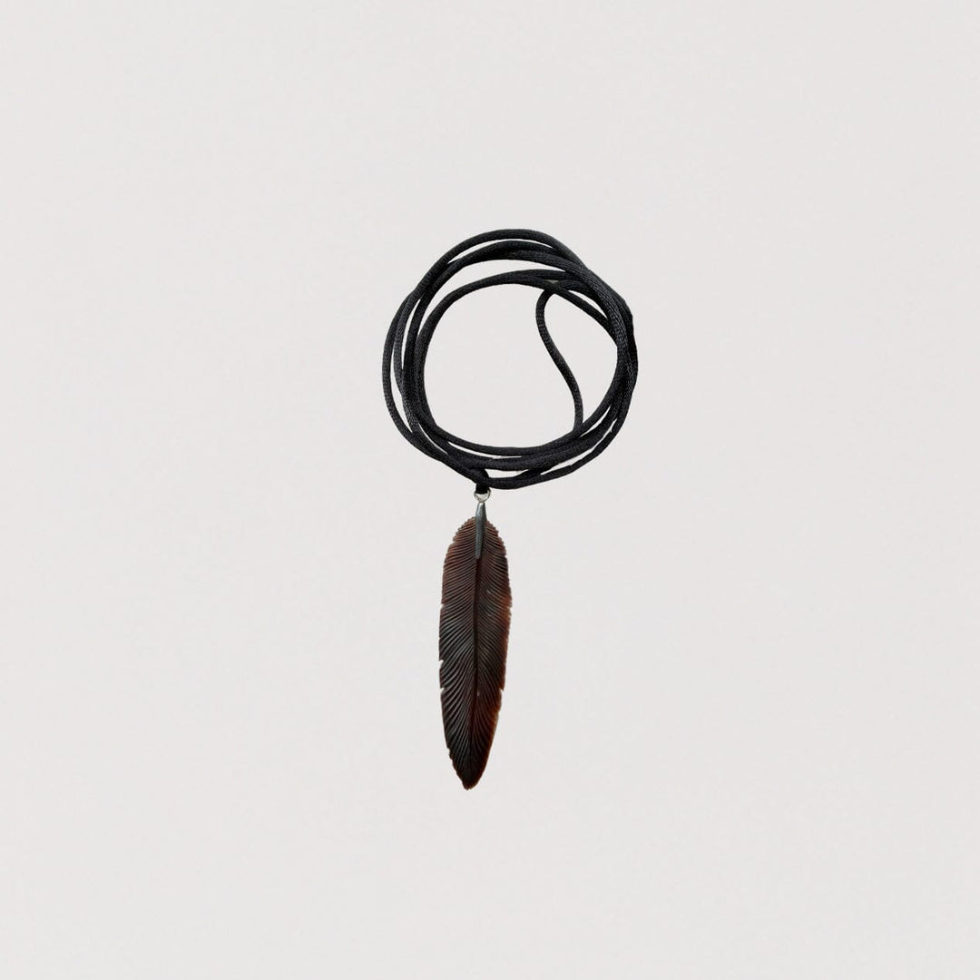 Carved Feather Pendant