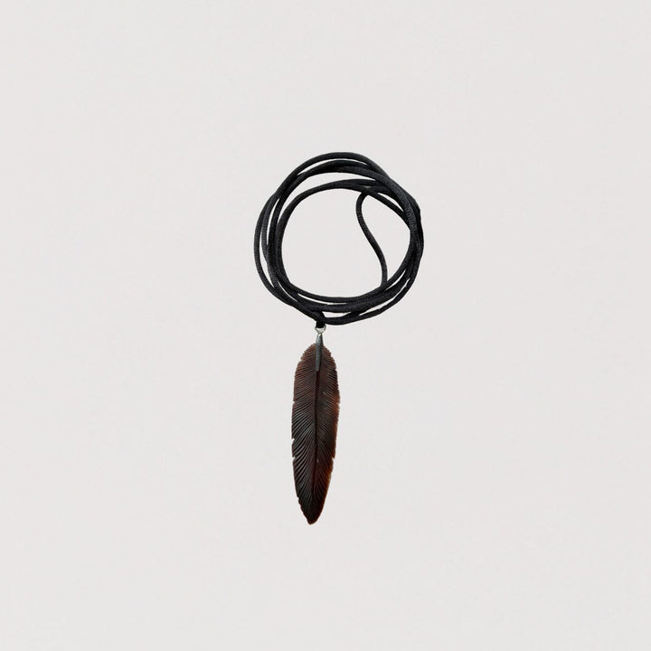 Carved Feather Pendant