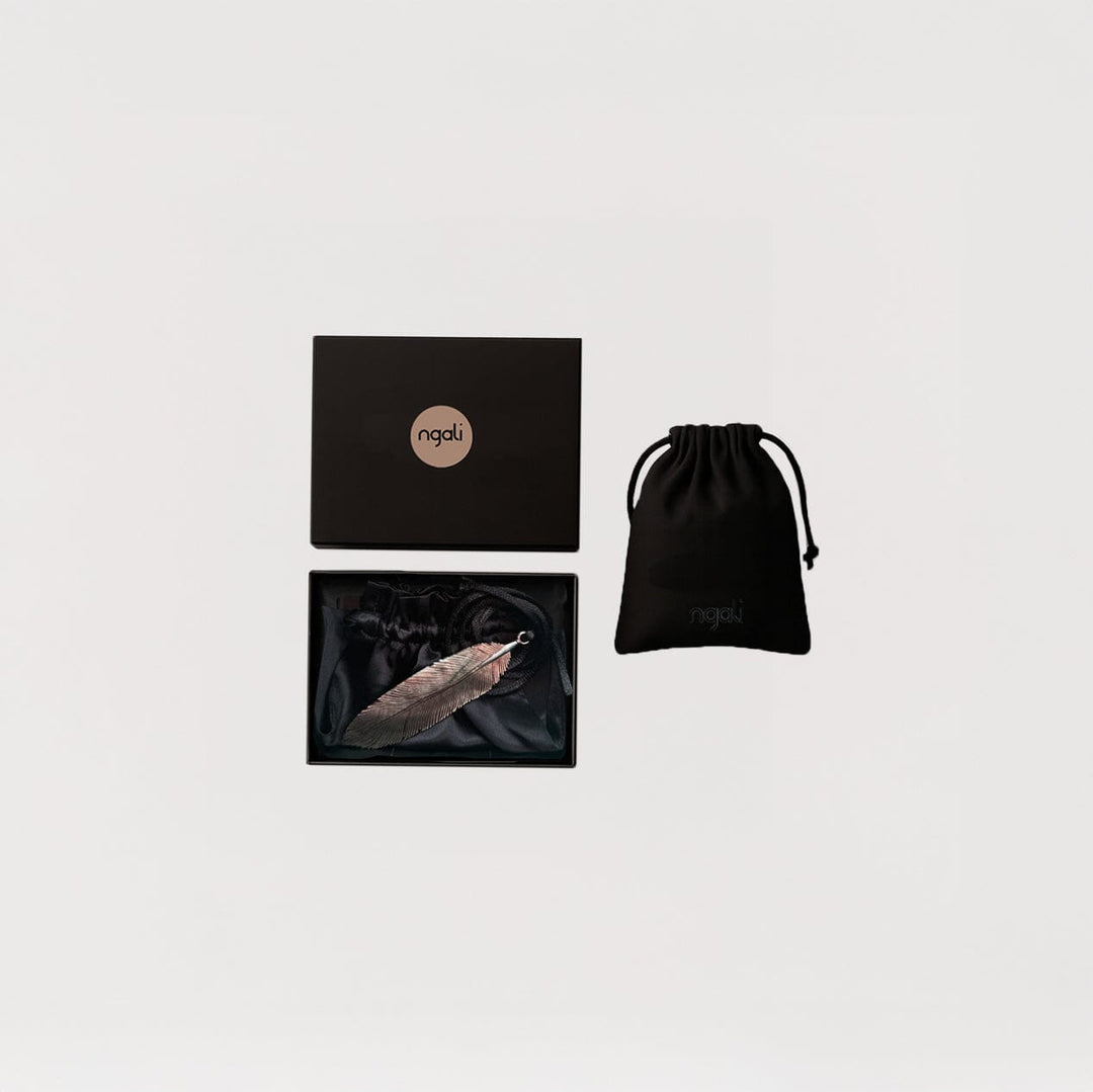 Carved Feather Pendant