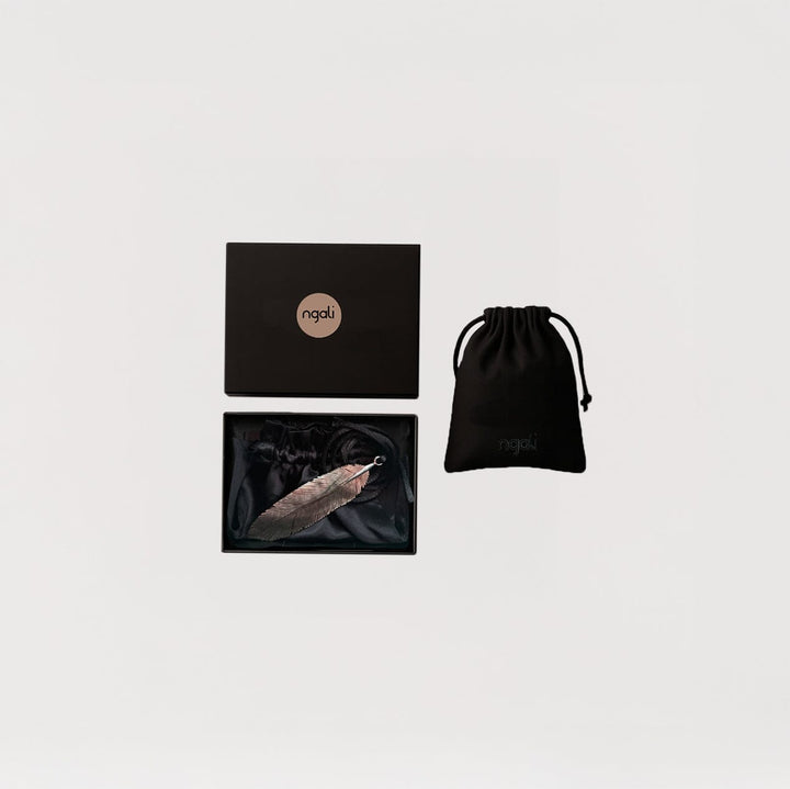 Carved Feather Pendant