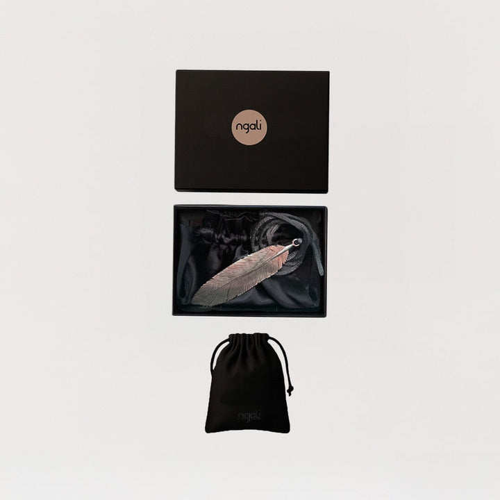 Carved Feather Pendant