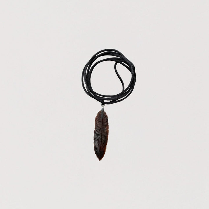 Carved Feather Pendant