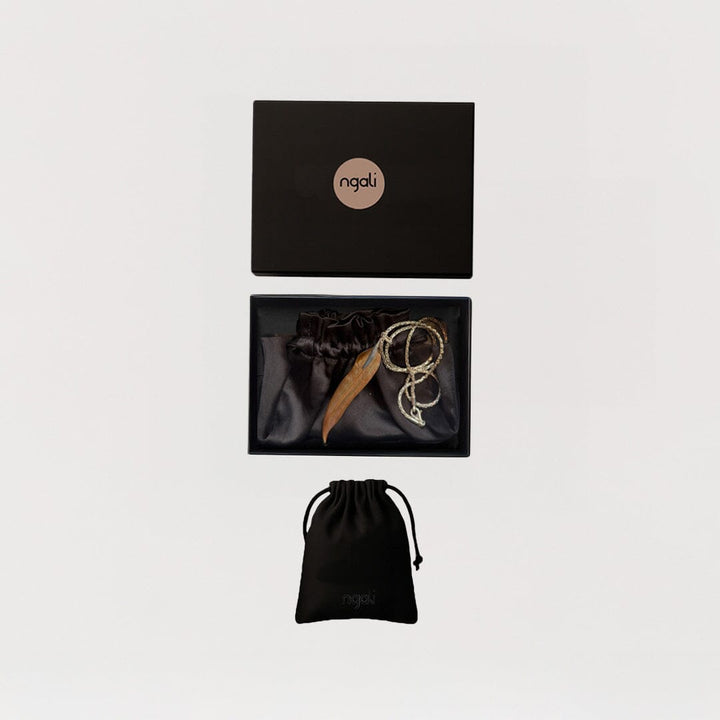 Carved Gum Leaf Pendant