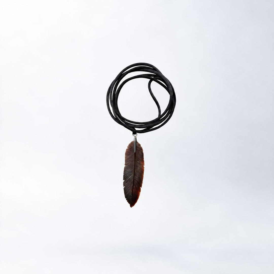 Carved Feather Pendant